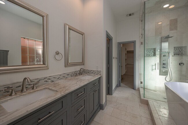 Building Photo - Spacious and beautifully designed with 5 bedrooms, 4 bath in a desirable location.