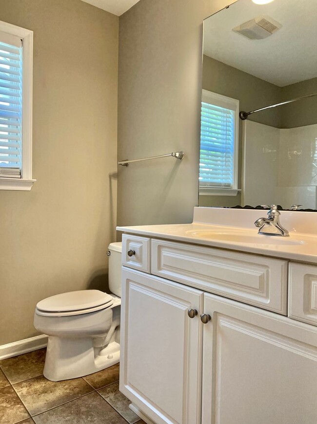 Building Photo - Spacious 3 BR House w/ Fenced Backyard and...
