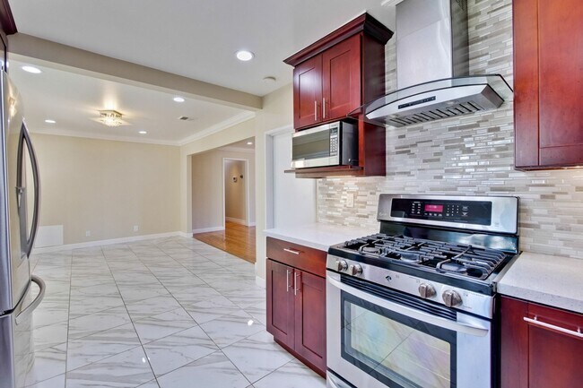 Building Photo - Turnkey Home with Natural Light & Upgrades...