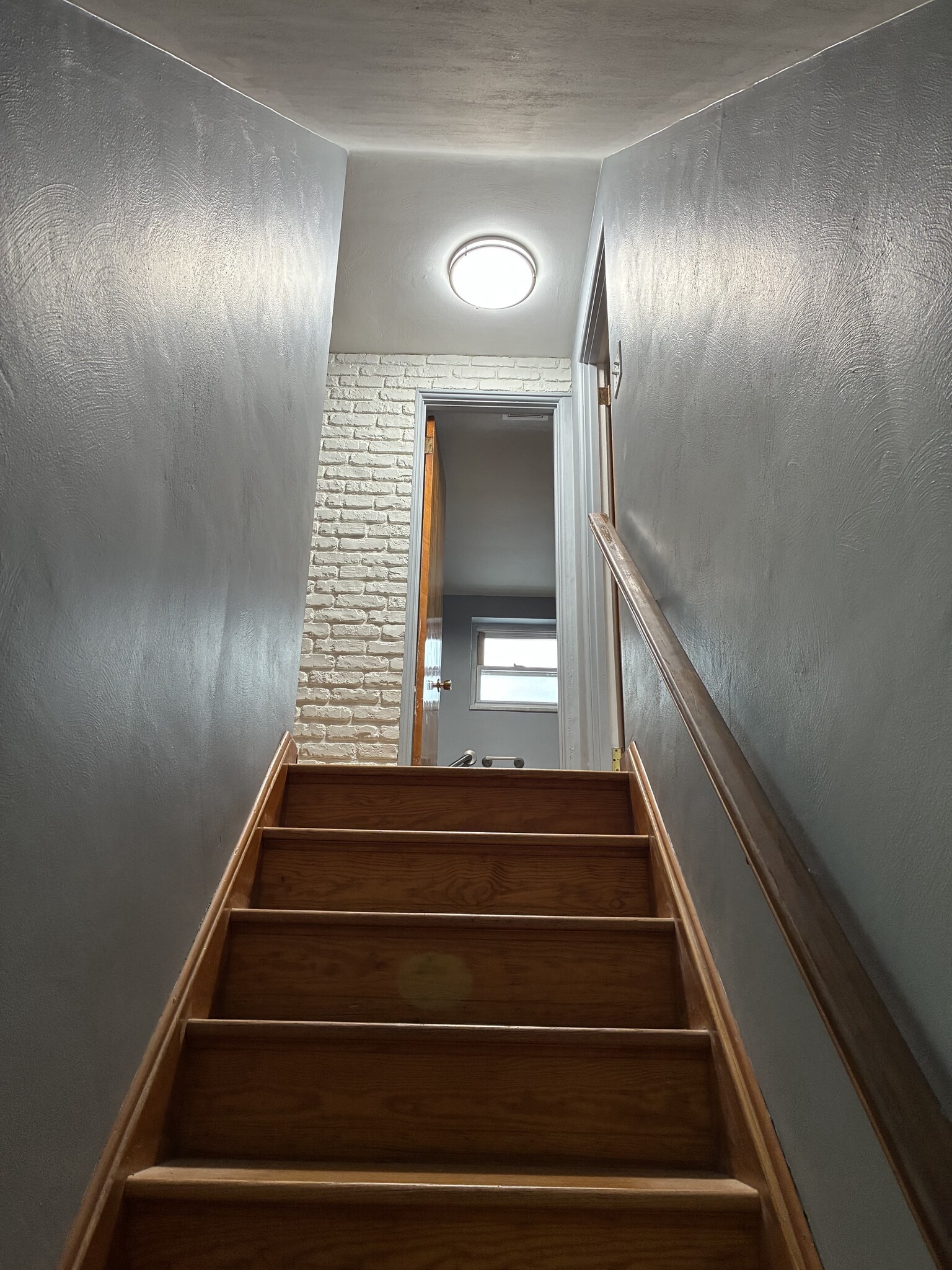 Stairway to second floor from front door entry way - 1714 Fair Acres Ave