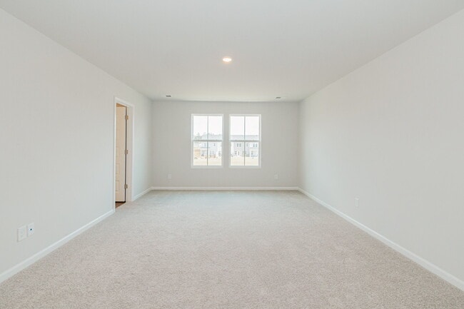 Building Photo - Brand-new 3 bedroom, 2.5 Bath Townhome with pond view
