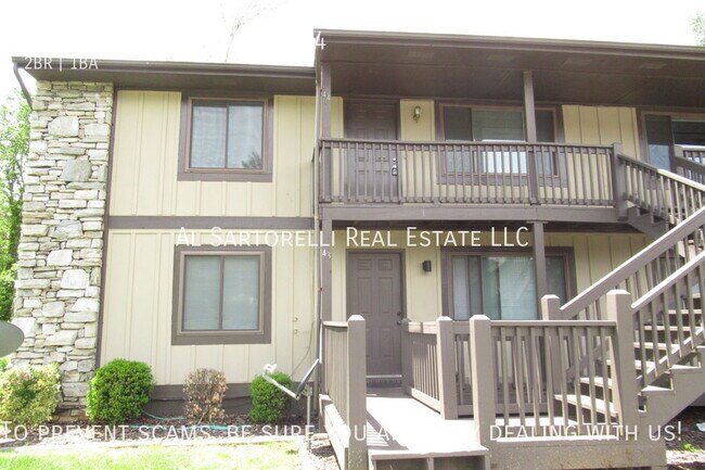 Building Photo - Pet Friendly Condo close to town and ready...