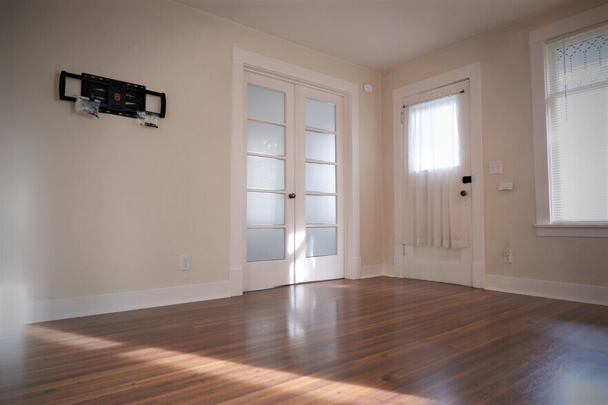 French door charm and living room that is ready for your TV! - 3517 E 32nd Ave