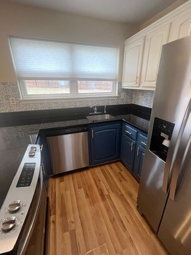 Building Photo - LOVELY CAPE COD WITH 4 BEDS, 2 BATHS AND G...