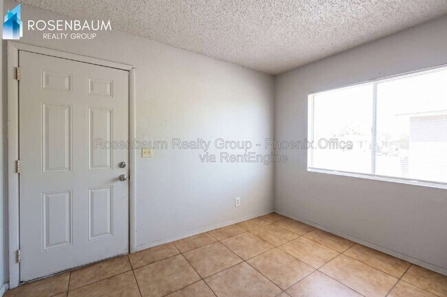 Building Photo - 6440 E Alder Ave