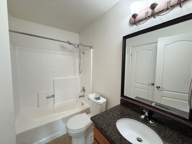 Building Photo - Resort-Style 2BR/2BA First-Floor Condo in Gated Lucera Community Near UTC