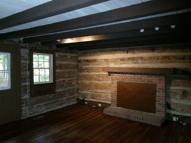 Building Photo - FOR RENT-Rustic log cabin home for RENT in...