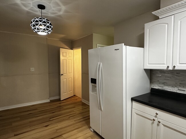 Kitchen with Appliances - 8811 N Washington St