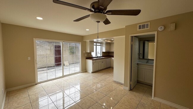 Building Photo - Modern Renovated 3-Bedroom Townhome in Gated Montclair Community | Pet-Friendly | 2-Car Garage | ...