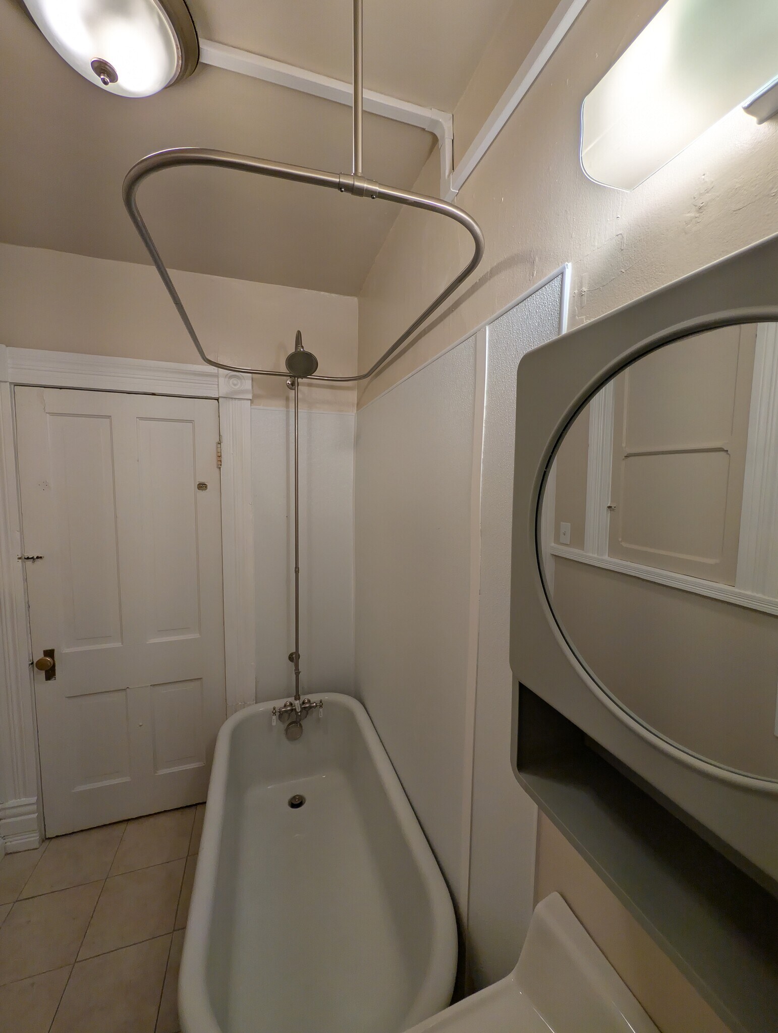 Original 1894 clawfoot tub w/ freshly upgraded shower (shower curtains included) - 1280 Race St