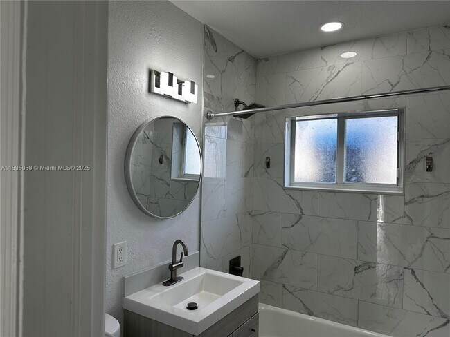 Building Photo - 6844 NW 5th Ave