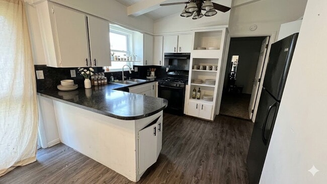 Building Photo - The Complete Package: 4BR with 2-Car Garage & Carport