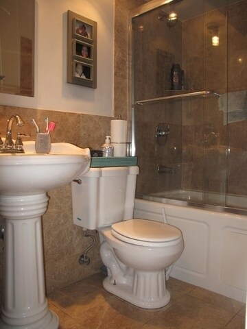 updated bathroom - 820 Austin N Blvd
