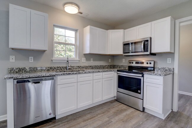 Building Photo - 1003 Windgate Dr