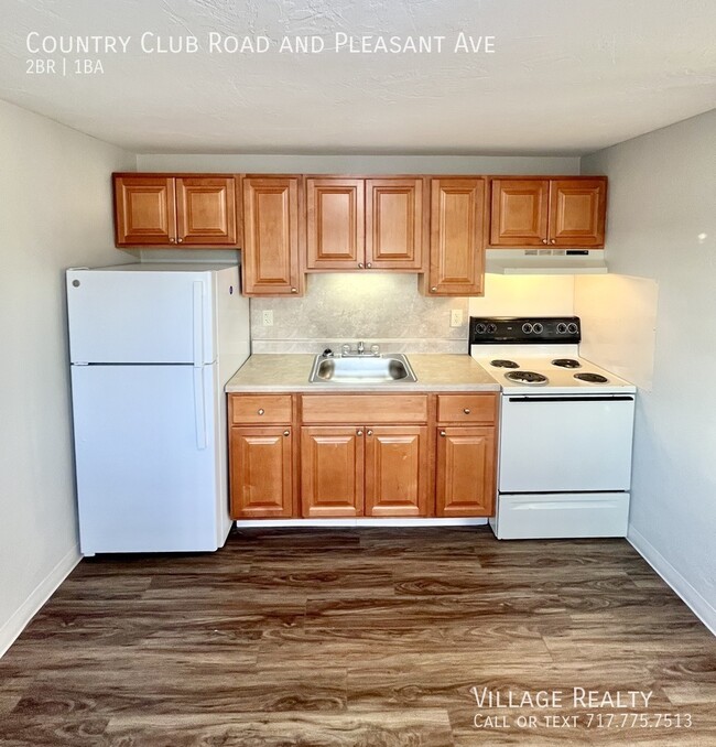 Building Photo - New Cabinets & Flooring! Large 2-bed w/ ea...