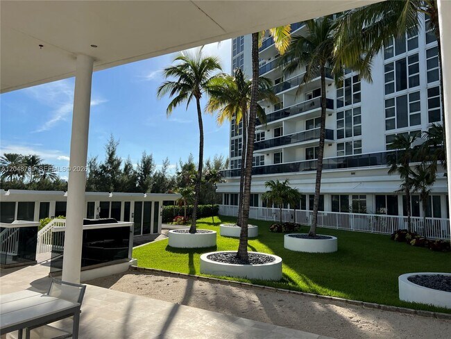 Building Photo - 10275 Collins Ave