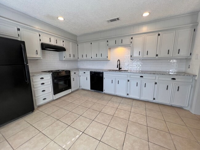 Building Photo - Completely Updated 3/2/2 in The Meadows close to Preston Smith Elementary