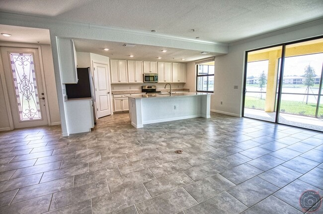 Building Photo - Annual Unfurnished Rental – New Construction Coach Home 3 Bedrooms, 2 Baths, 2 Car Garage, with R...