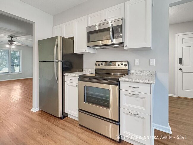 Building Photo - 5841/5843 Winnetka Ave N-5841