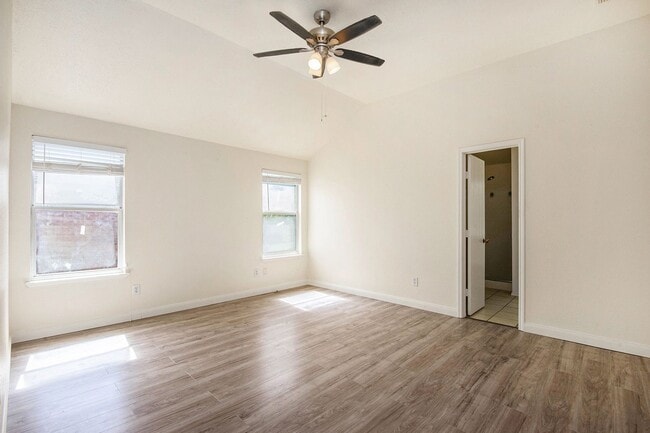 Building Photo - Welcome to this charming 4-bedroom, 2-bath...