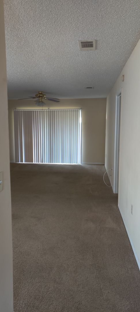 Building Photo - CORAL GARDENS 2 BEDROOM CONDO