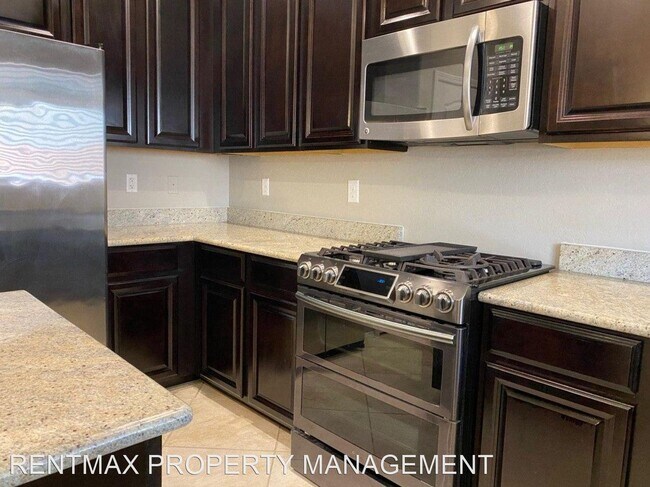 Building Photo - 4 br, 2.5 bath House - 688 CALAMUS PALMS PL