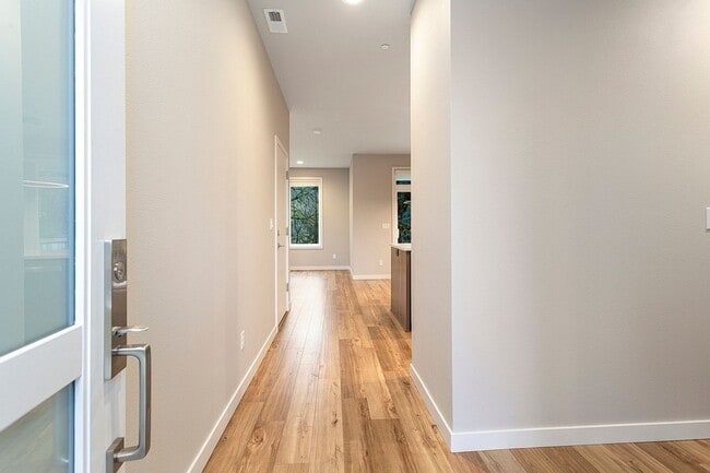 Building Photo - 2022 Build -Almost Brand New 3 br 2.5 bth Home with hardwoods, fenced yard and backs to greenspace !