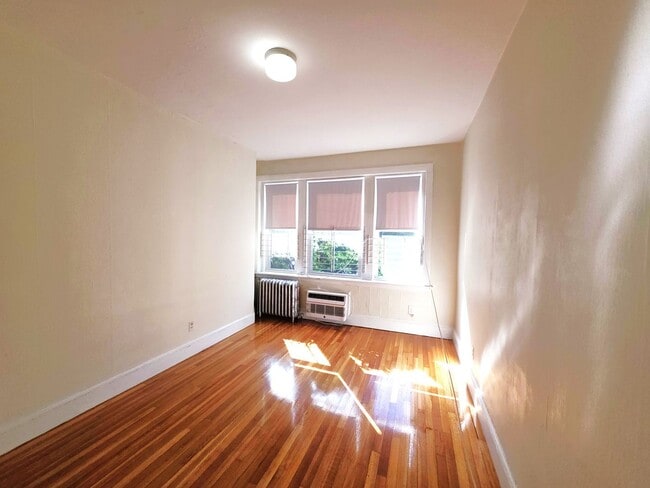 Building Photo - No Brokers Fee, No Security Deposit,  Heat, Hot Water Included, Elevator, Laundry, Parking for Rent