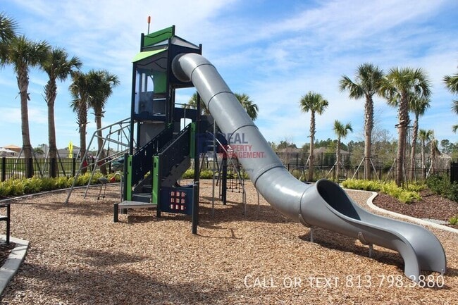 Building Photo - 1716 Tropical Oasis Ave