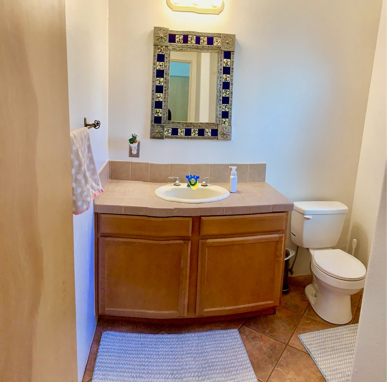 1/2 bath by entryway - 4750 Quemazon