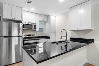 Building Photo - Crown Molding & Granite Kitchens********* Renovated 2 Bedroom 1.5 Bath********* Beautiful Townhom...