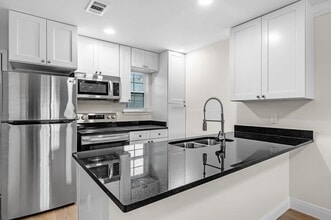 Building Photo - Discover Peaceful Luxury Living in This Stunning 2-Bedroom 1.5 Bath Apartment