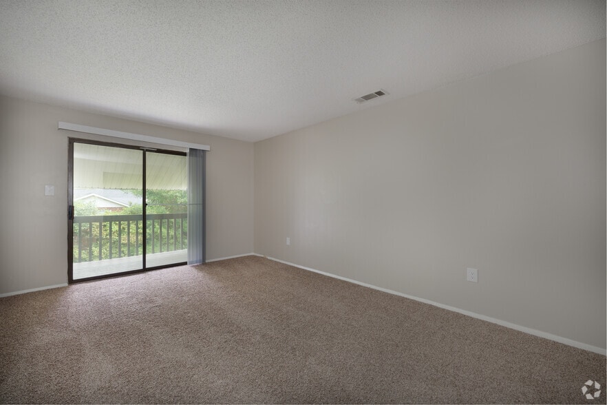 2BR, 1BA - 880SF - Living Room - Amelia Apartments and Townhomes