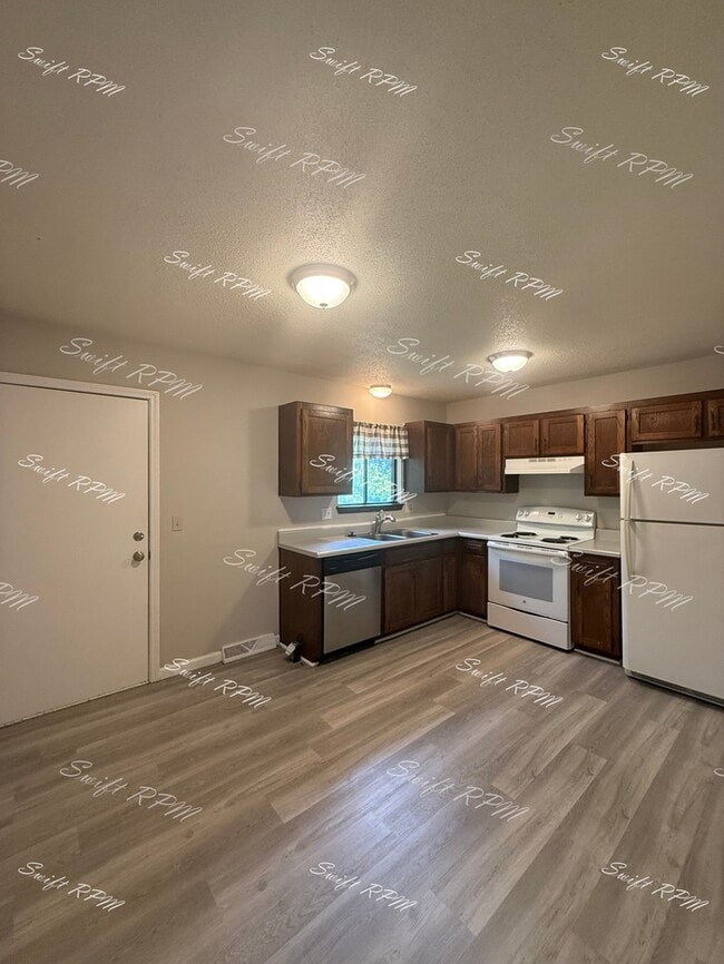 Building Photo - 12915 W 61st Terrace