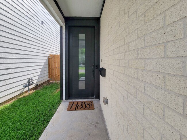 Building Photo - This 4-bedroom, 3-bathroom, two-story residence comes with a generous two-car attached garage. Re...