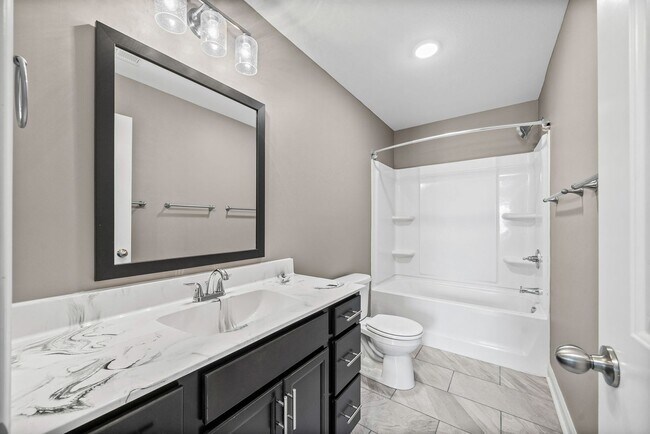 Building Photo - Pet Friendly Three Bedroom with Bonus!