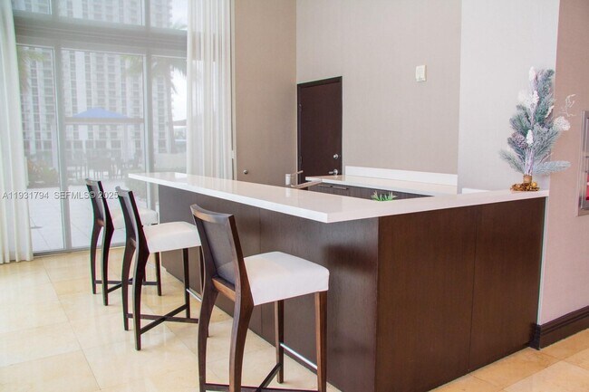 Building Photo - 18911 Collins Ave