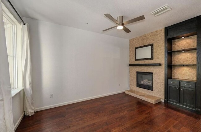 Building Photo - Experience Esplanade! Premier Townhome Com...