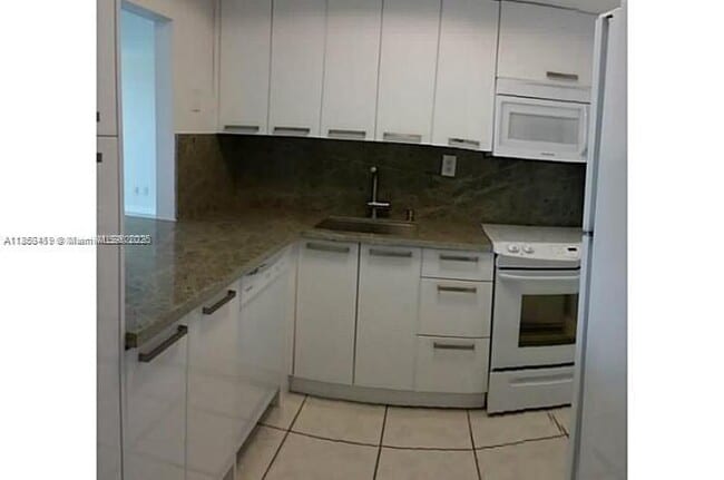 Building Photo - 5401 Collins Ave