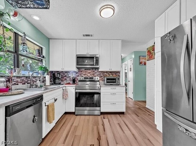Building Photo - 141 Rainbow Dr NW