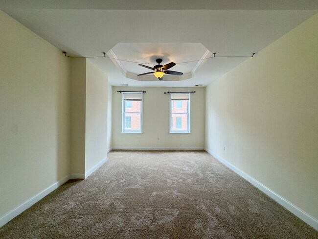 Building Photo - Inviting 3-Bedroom Single Family Townhome ...