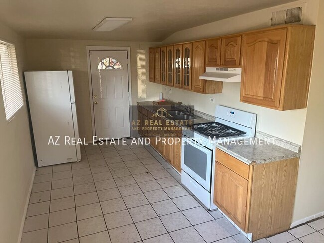 Building Photo - 3841 N 63rd Dr