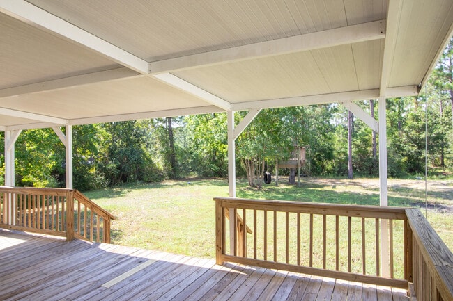 Building Photo - 9289 E River Dr