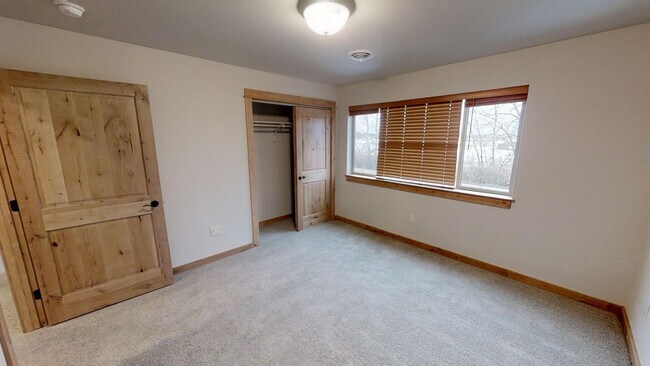 Building Photo - Spacious Townhome with Central Heat/Air - Two Car Garage, Fenced in Backyard! **EARLY BIRD PRICIN...