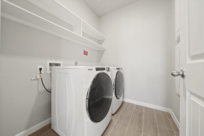 Building Photo - "Charming 4-Bed Sanctuary on Gentle Breeze Lane - Spacious 1861 Sq. Ft. Home with 2 Full Baths in...