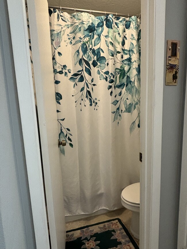 Private shower and toilet room. - 3515 Sable Palm Ln