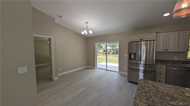 Building Photo - 7708 N Paris Dr