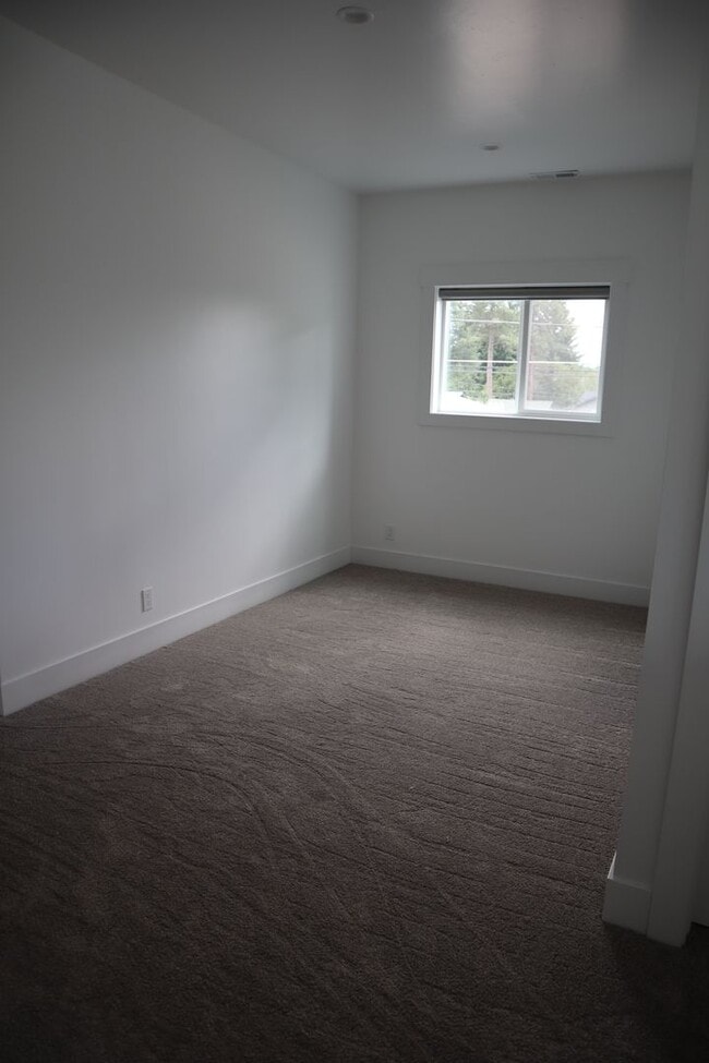 Building Photo - Custom Build in Downtown CDA!