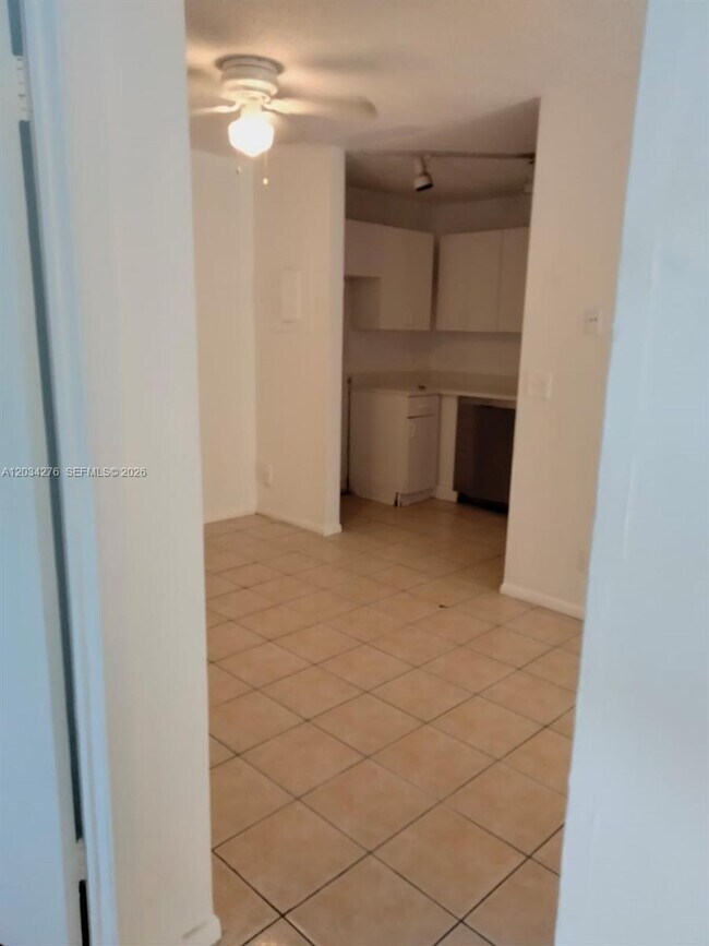 Building Photo - 10886 Royal Palm Blvd