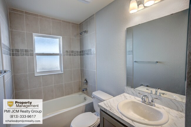 Building Photo - "Discover Your Dream Home: Spacious 4-Bedr...